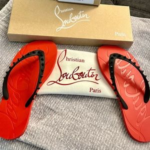 Christian Louboutin flip flops, size 40, red sole with black spike thong.